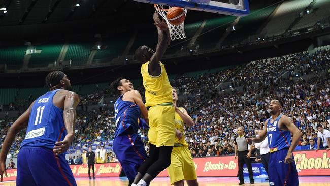 Australia's Thon maker slams a dunk against the Philippines