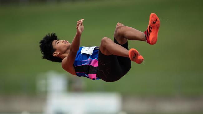 Kurt Michael flies high in his high jump event.