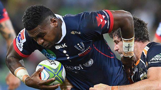 MELBOURNE, AUSTRALIA - MARCH 08: Isi Naisarani of the Rebels is tackled during the round four Super Rugby match between the Rebels and the Brumbies at AAMI Park on March 08, 2019 in Melbourne, Australia. (Photo by Quinn Rooney/Getty Images)