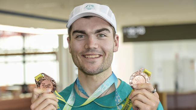 Conor Leahy shows off his medals. Picture: NCA NewsWire / Roy VanDerVegt