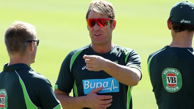 CAPE TOWN, SOUTH AFRICA - FEBRUARY 27: Shane Warne speaks to players during an Australian nets session at Newlands Stadium on February 27, 2014 in Cape Town, South Africa. (Photo by Morne de Klerk/Getty Images)