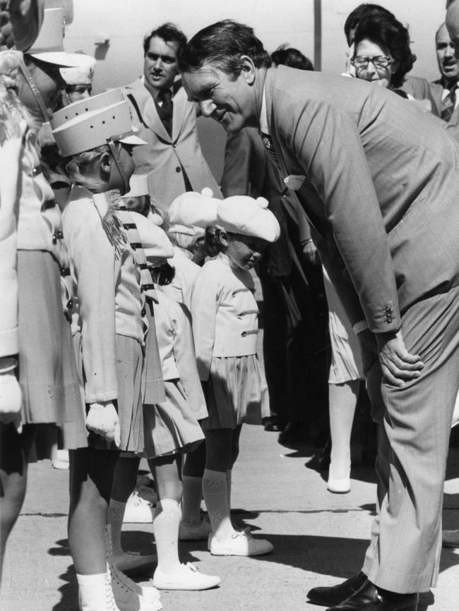 Then-prime minister Malcolm Fraser greeted by marching girls at Whyalla Airport, 1977, during the Federal Election campaign visit.