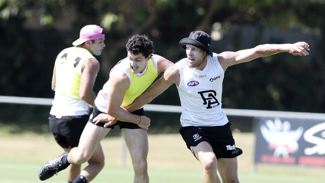 Darcy Byrne-Jones and Brad Ebert jostle on Port’s pre-season training camp in Maroochydore. Picture: Sarah Reed