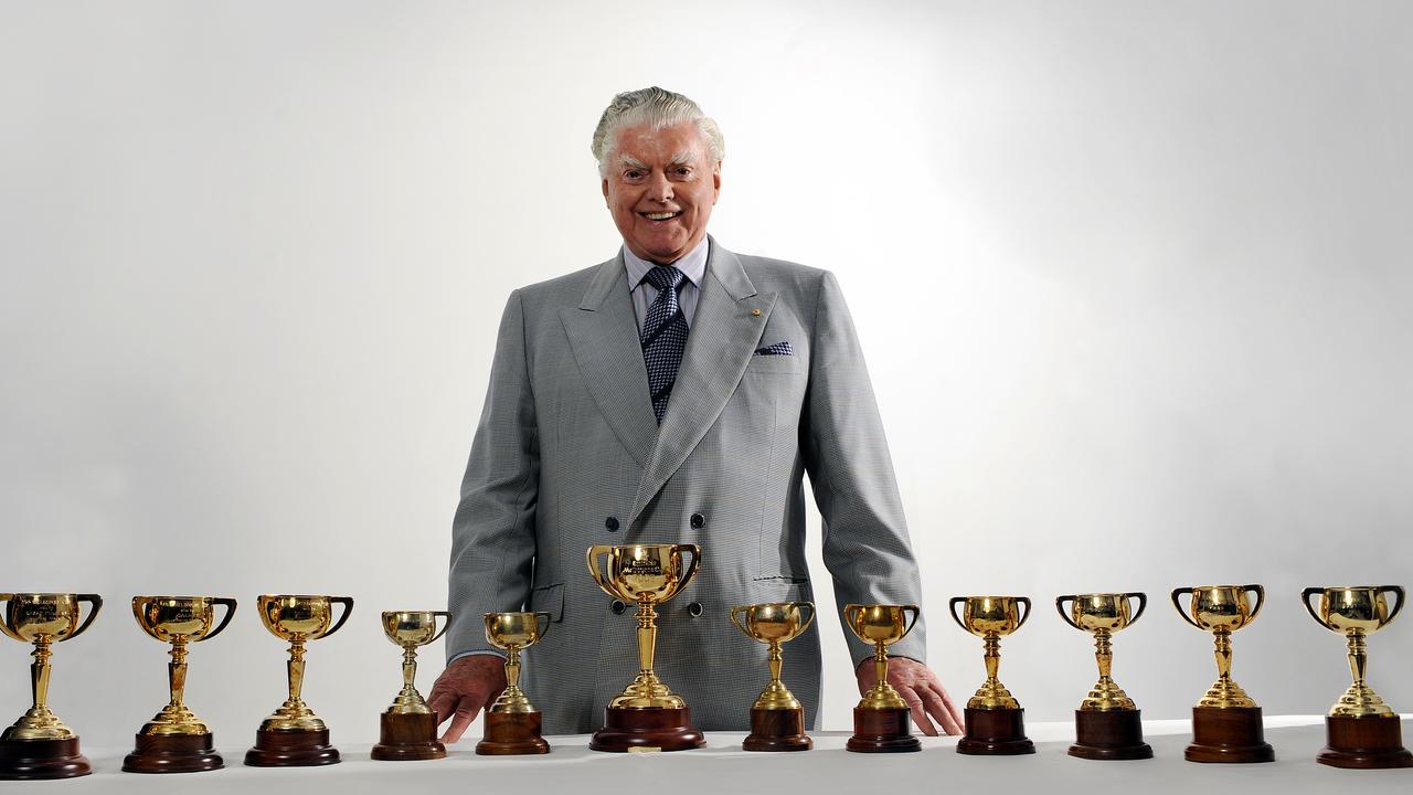 Australia's most successful horse trainer Bart Cummings, with his 12 Melbourne Cup trophies. Cups.