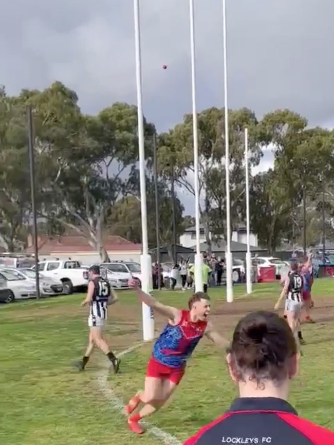 Haren celebrates as his kick sails through the sticks. Supplied: Lockleys Football Club