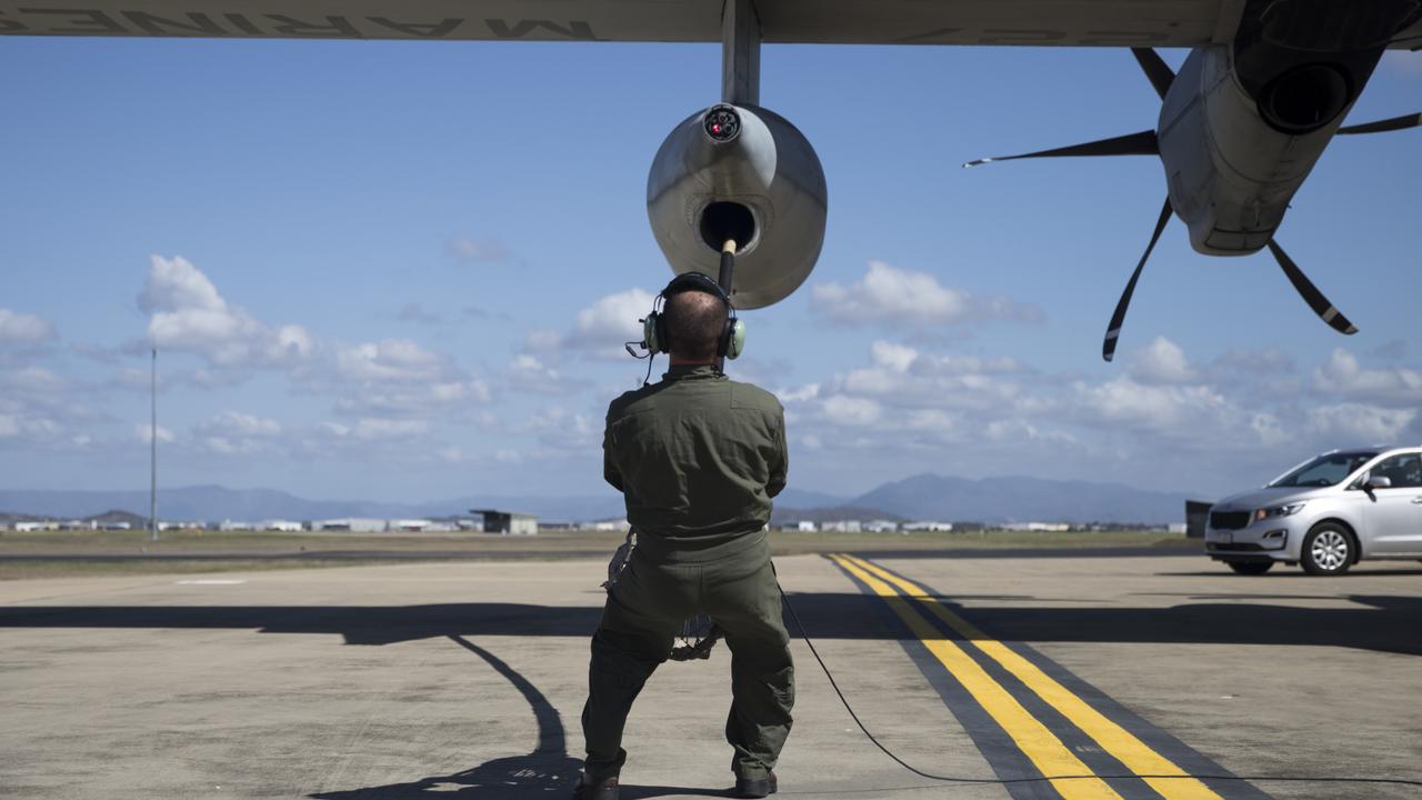 U.S. Marine Corps Staff Sgt. Joseph Szombathelyi, an aircrew master with Marine Aerial Refueler Transport Squadron (VMGR) 152, conducts a drogue change prior to taking off in support of Talisman Sabre 21 from Royal Australian Air Force Base Townsville, Australia, July 13, 2021. TS21, the ninth iteration and conducted since 2005, occurs biennially across Northern Australia. Australian, US and other multinational partner forces use Talisman Sabre to enhance interoperability by training in complex, multi-domain operations scenarios that address the full range of Indo-Pacific security concerts. (U.S. Marine Corps photo by Cpl. Bryant Rodriguez)