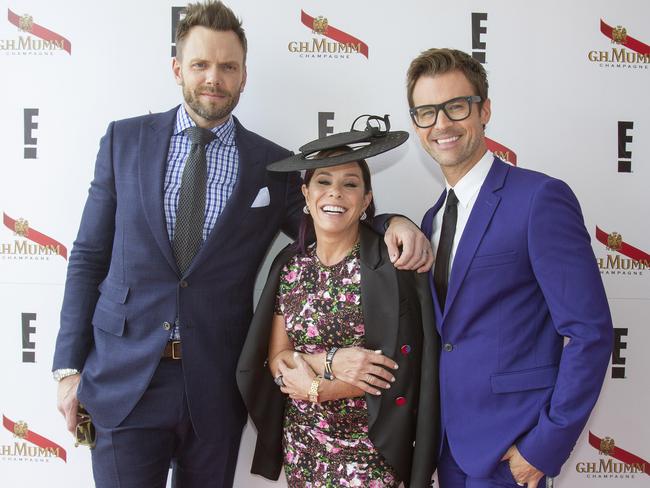 In the Mumm Marquee at the Melbourne Cup ... Actor Joel McHale with Fashion Police co-hosts Melissa Rivers and Brad Goreski. Picture: Luis Ascui / Getty Images