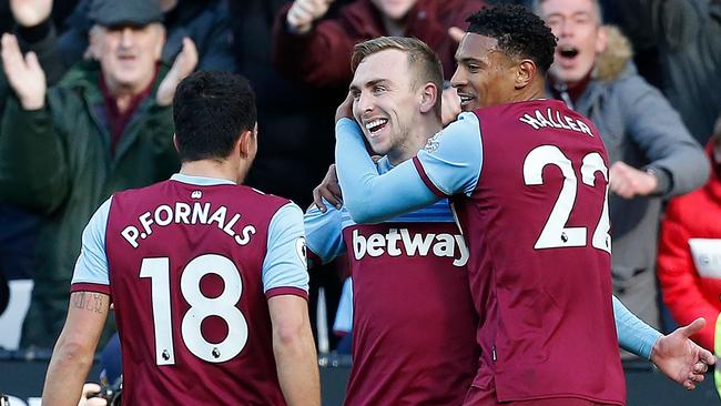 West Ham United's English striker Jarrod Bowen (C) celebrates scoring a goal with West Ham United's French striker Sebastien Haller (R) and West Ham United's Spanish midfielder Pablo Fornals. Picture: Ian Kington/AFP