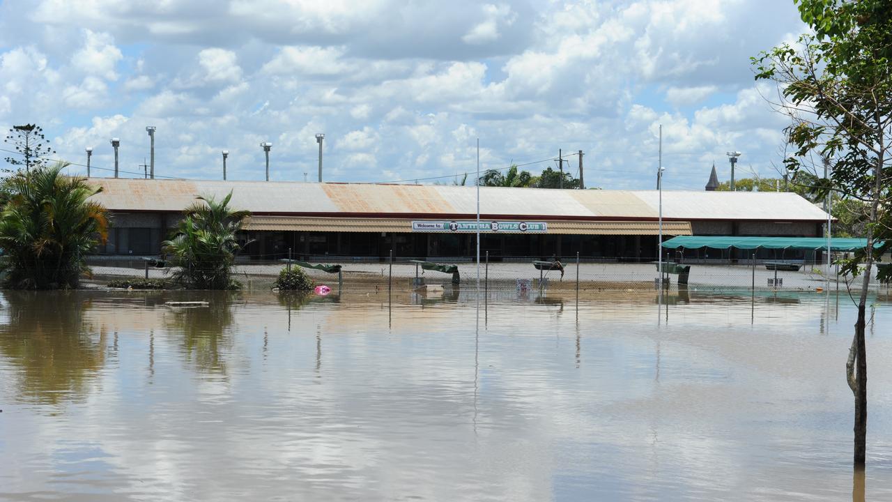 RECEDING WATER: The Tantitha Bowls Club in Tantitha Street slowly emerges from the receding flood waters during the 2013 floods in Bundaberg. Photo: Mike Knott / NewsMail