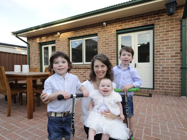 Danielle Butler with children Oliver, 5yrs, Patrick, 3yrs and Caitlin at 24 Weil Ave, Croydon Park. Picture: Craig Wilson