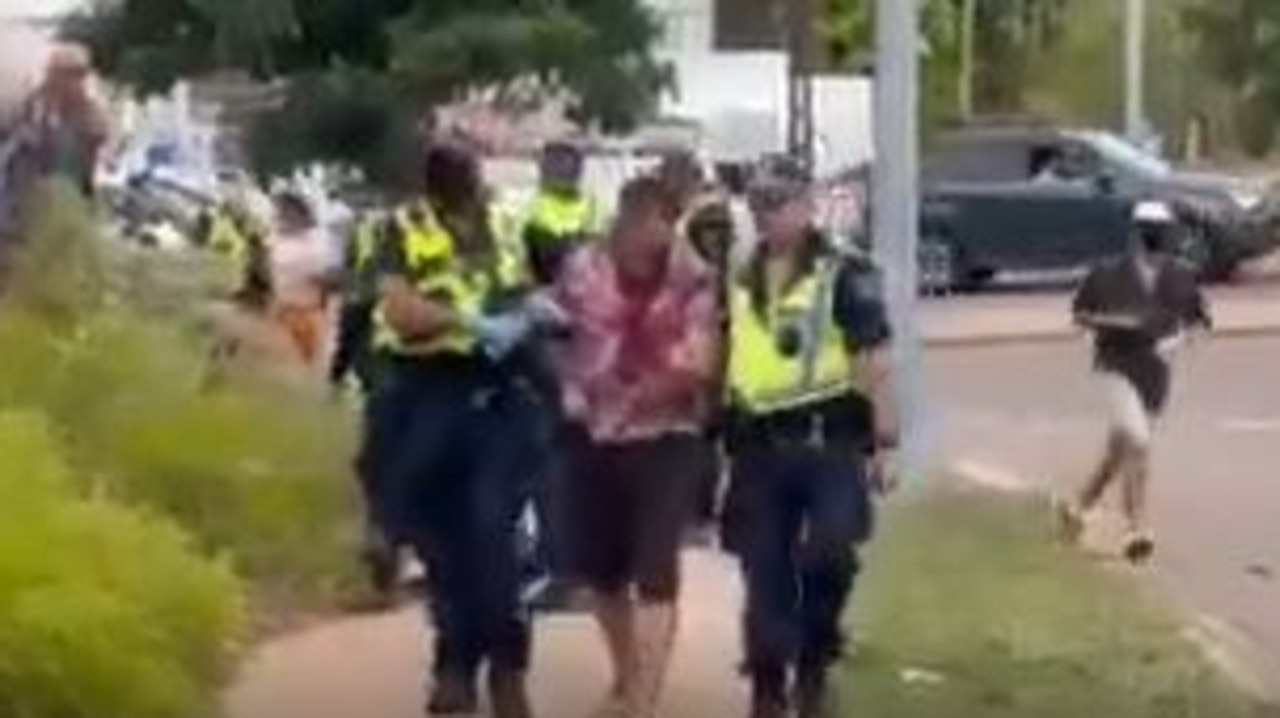 A man being arrested by NT Police near the Botanic Gardens.