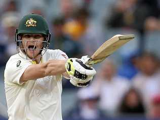 Steve Smith's unique batting style has been compared favourably to the technique Don Bradman developed famously by hitting a golf ball with a cricket stump. (AP Photo/Rick Rycroft). Picture: Rick Rycroft