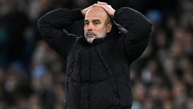 MANCHESTER, ENGLAND - MARCH 01: Pep Guardiola, Manager of Manchester City, looks dejected during the Emirates FA Cup Fifth Round match between Manchester City and Plymouth Argyle at Etihad Stadium on March 01, 2025 in Manchester, England. (Photo by Justin Setterfield/Getty Images)