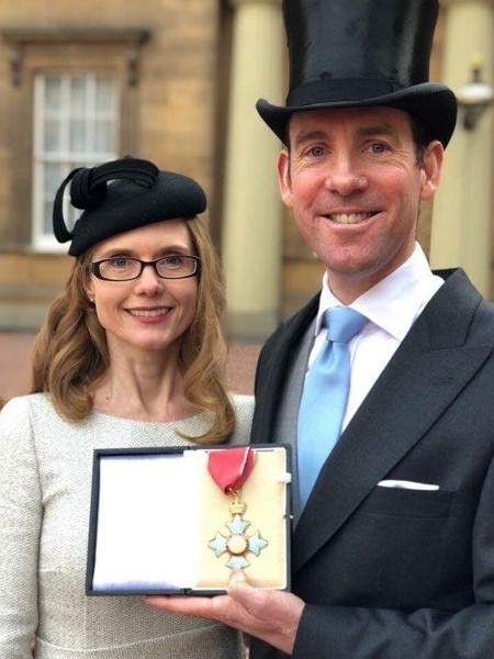 Lex Greensill with his award from Prince Charles.