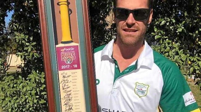 Roma and District Cricket Association president Scott Hilton with the signed Queensland Bulls Sheffield Shield bat that will be auctioned to raise funds. Picture: Contributed