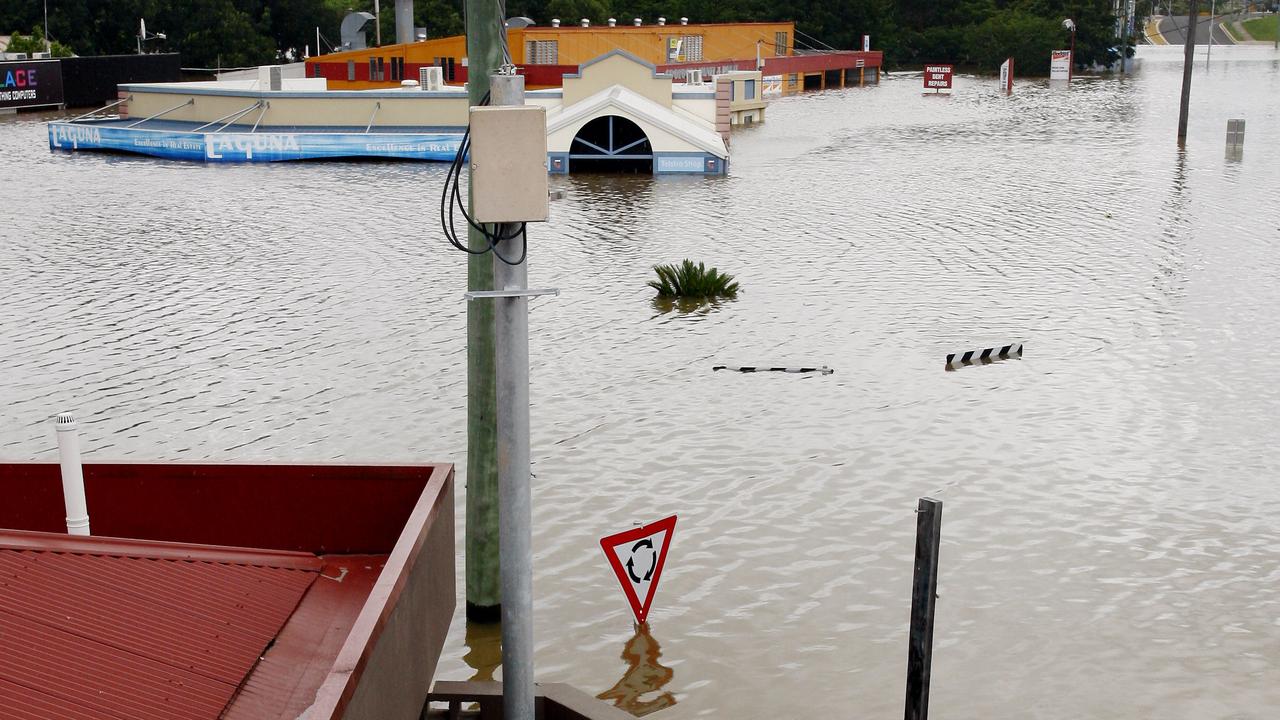 In the 2011 floods from The Royal Hotel looking south toward Reef St. Picture: Megan Slade