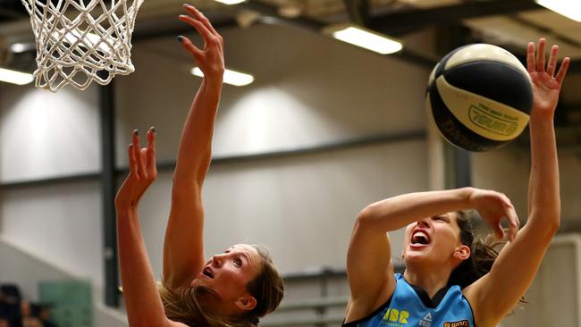 Jennifier Hamson gets a shot blocked by Marianna Tolo during a game earlier this season. She is now back from injury.