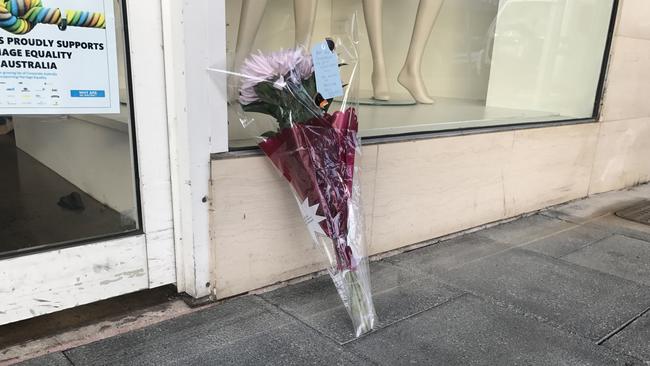 A flower tribute at the scene where Rex Court was bashed in Mount Gambier. Picture: Simon Cross.