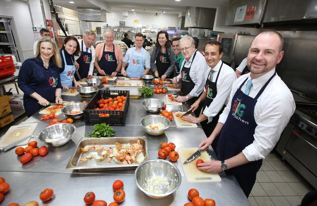 Liberal preselection candidates pitch in at Our Big Kitchen. Picture: AAP Image / Bob Barker