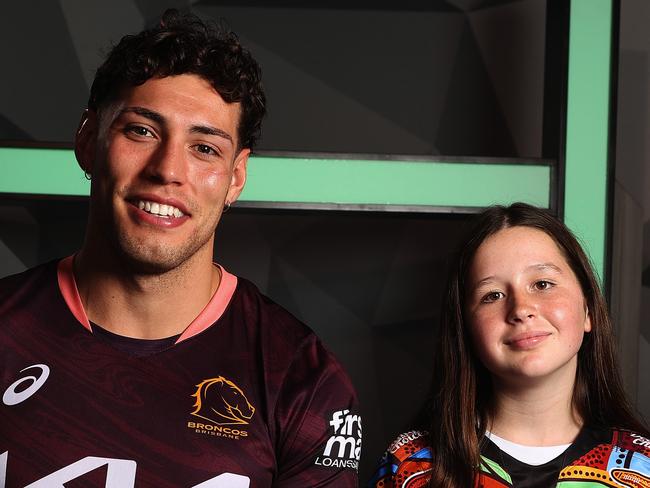 11 year-old interviewer Sophie Fraser with Brisbane Broncos player Jordan Riki, Bowen Hills. Picture: Liam Kidston