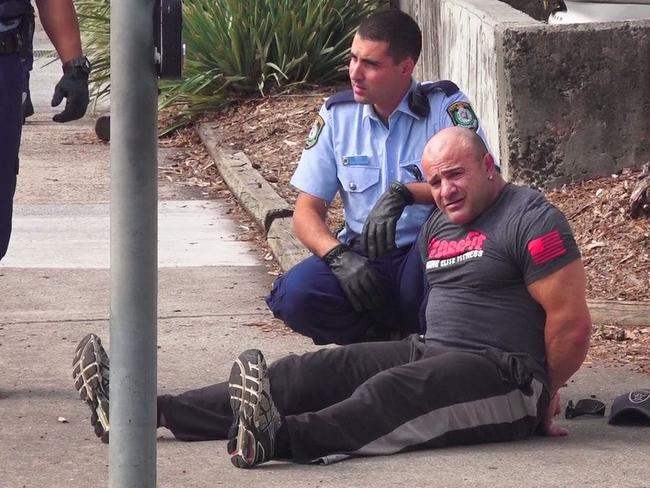 A man is detained at the scene. Picture: TNV