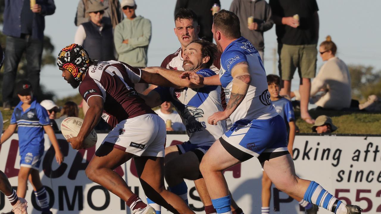 William Johnstone of Tugun Seahawks tries to tackle Shallin Fuller of Burleigh Bears. Picture: Regi Varghese