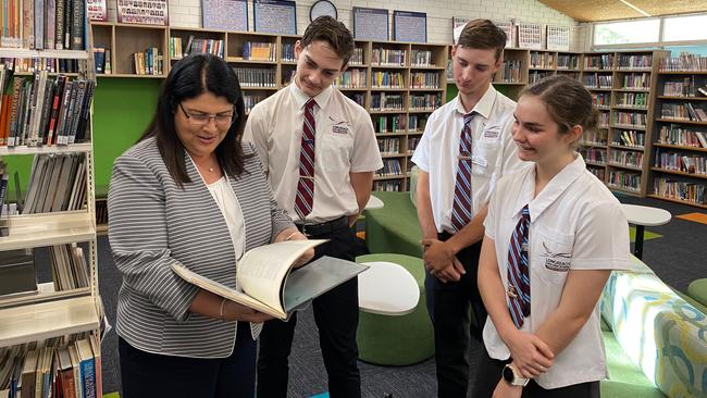 Education Minister Grace Grace with Longreach State High School students Hugo, Seth and Aiyahna.