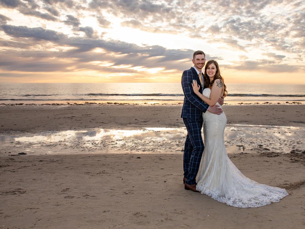 Rhiannon Guest and Bradley Bentham, married at Seawall Apartments, Just Believe Photography. The couple postponed their wedding, then decided to elope with only two witnesses before telling their family and friends, who were all very happy for the newlyweds.