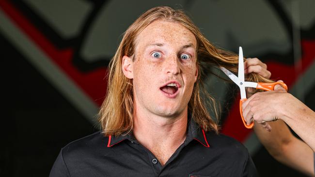 Essendon star Mason Redman is shaving his king hair for cancer support awareness as part of the Big Red’s Big Groom initiative Picture: Supplied