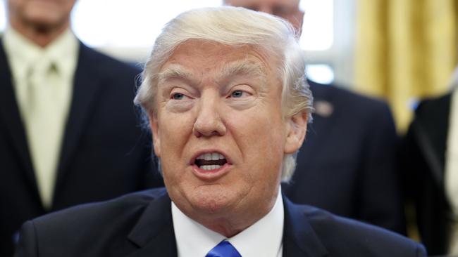 As a judge halted deportations, Donald Trump praised his ban on people from seven nations entering the US.