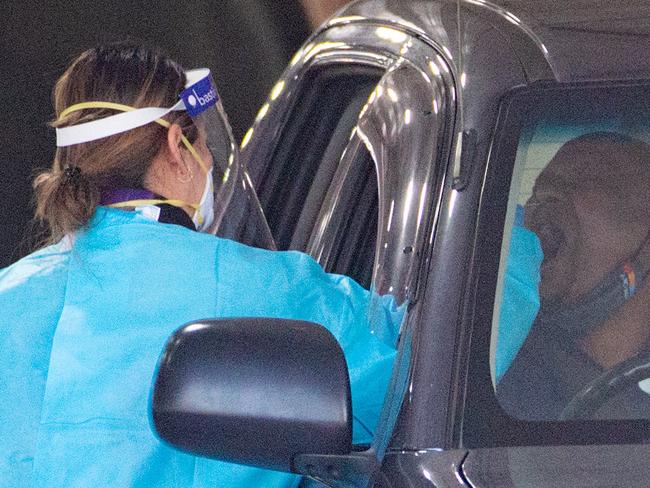 MELBOURNE, AUSTRALIA- NewsWire Photos JULY 29 2021: Health workers are seen at Mason Street, Altona North Drive Through COVID- 19 testing site. Picture: NCA NewsWire / Sarah Matray.