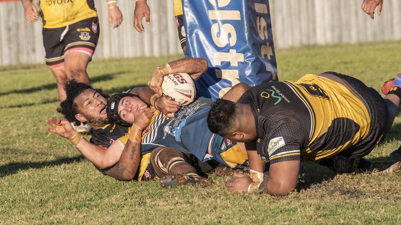 George Tavita for Gatton holds up Thomas Hatch for Highfields. Picture: Nev Madsen