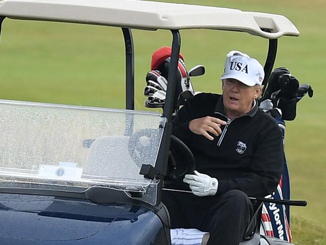 TURNBERRY, SCOTLAND - JULY 15:  U.S. President Donald Trump plays a round of golf at Trump Turnberry Luxury Collection Resort during the U.S. President's first official visit to the United Kingdom on July 15, 2018 in Turnberry, Scotland. The President of the United States and First Lady, Melania Trump on their first official visit to the UK after yesterday's meetings with the Prime Minister and the Queen is in Scotland for private weekend stay at his Turnberry.  (Photo by Leon Neal/Getty Images)