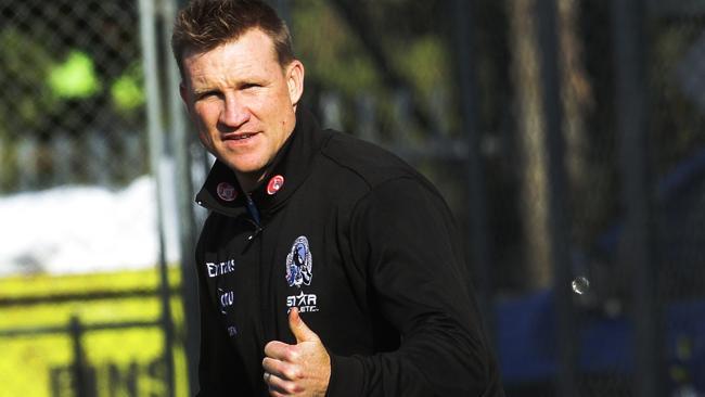  Collingwood coach Nathan Buckley in action at training at Olympic Park oval.