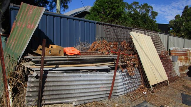 A fraction of the material collected in a cluttered suburban yard.