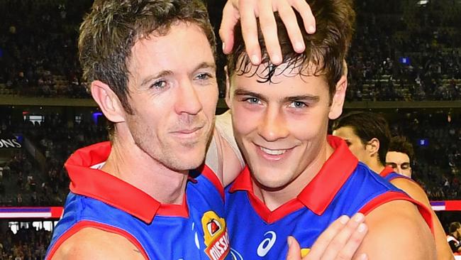 The ugly incident has marred the 300th match of Western Bulldogs legend Robert Murphy (left). Picture: Quinn Rooney/Getty Images