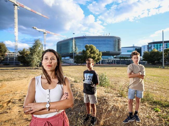 NEWS ADVMum Carla Caruso of Hawthorn with her twin boys Sebastian & Alessio 8 Elsby (aged 8) at Helen Mayo Park which is a degraded wasteland, when it should be restored and transformed into a green oasis in the city. .  IMAGE/Russell Millard