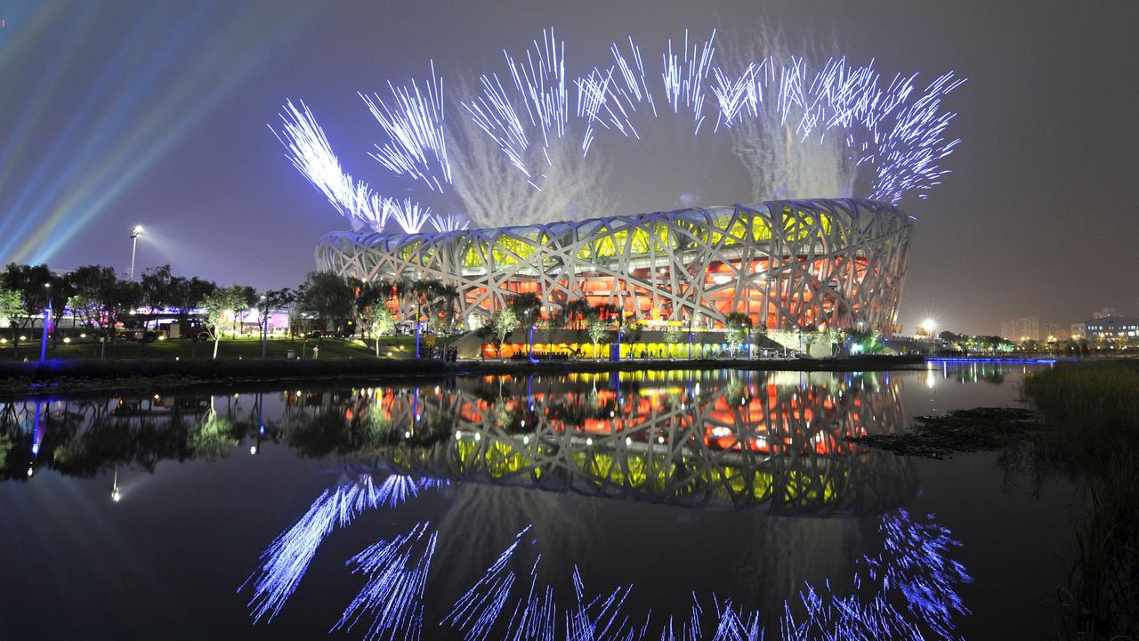 Fireworks explode over China’s National Stadium, which was also known as the “Bird’s Nest”, during the Beijing Olympic Games opening ceremony in 2008. Picture: AFP
