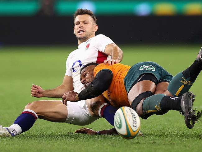 Danny Care is tackled by Samu Kerevi as the Wallabies finally snapped England’s dominance over the home side.