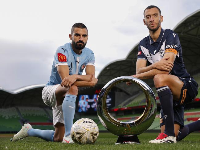 Melbourne City captain Aziz Behich and Melbourne Victory captain Roderick Miranda. Picture: Michael Klein