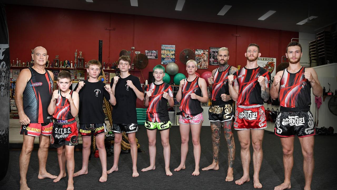 Coach, Joe Hilton with his fighters Charlie Turner, 11, Josh Robson, 13, Jake Hatfield, 15, Skylah Hamill, 17, Jorja Hersey, 17, Moe Russ, 30, Andre Fleming, 26, Ky Newton, 21. Picture: Patrick Woods.