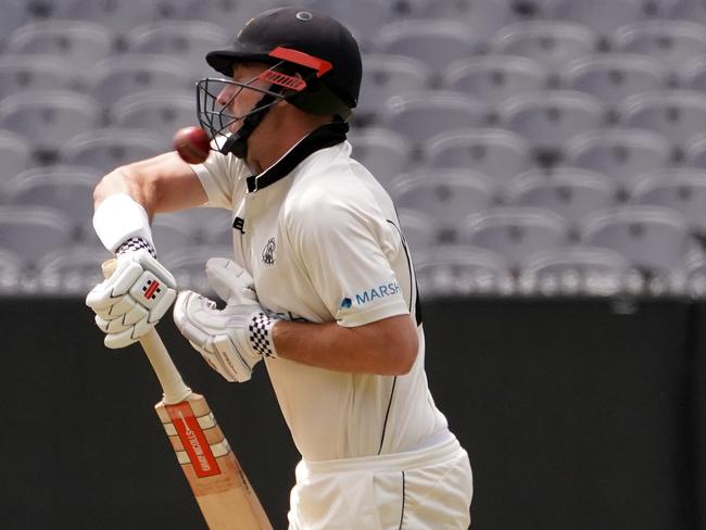 Western Australia’s Shaun Marsh cops a ball to the helmet during their Sheffield Shield match against Victoria at the MCG. An unsafe pitch led to the match being abandoned. Picture: AAP