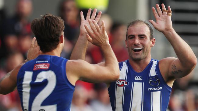 HOBART, AUSTRALIA – MAY 02: Ben Cunnington of the Kangaroos celebrates a goal during the 2021 AFL Round 07 match between the North Melbourne Kangaroos and the Melbourne Demons at Blundstone Arena on May 02, 2021 in Hobart, Australia. (Photo by Dylan Burns/AFL Photos via Getty Images)