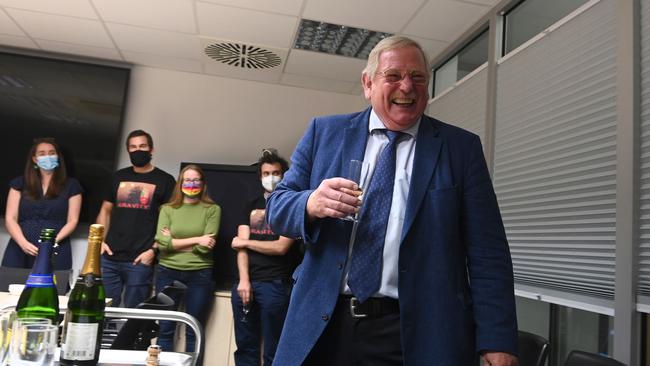 Reinhard Genzel celebrates with colleagues at the Max Planck Institute on Tuesday night. Picture: AFP