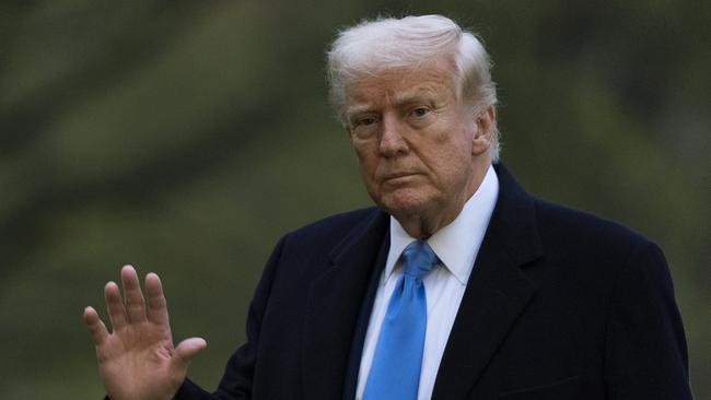 Donald Trump arrives back at the White House after a four-day golf weekend. Picture: AP