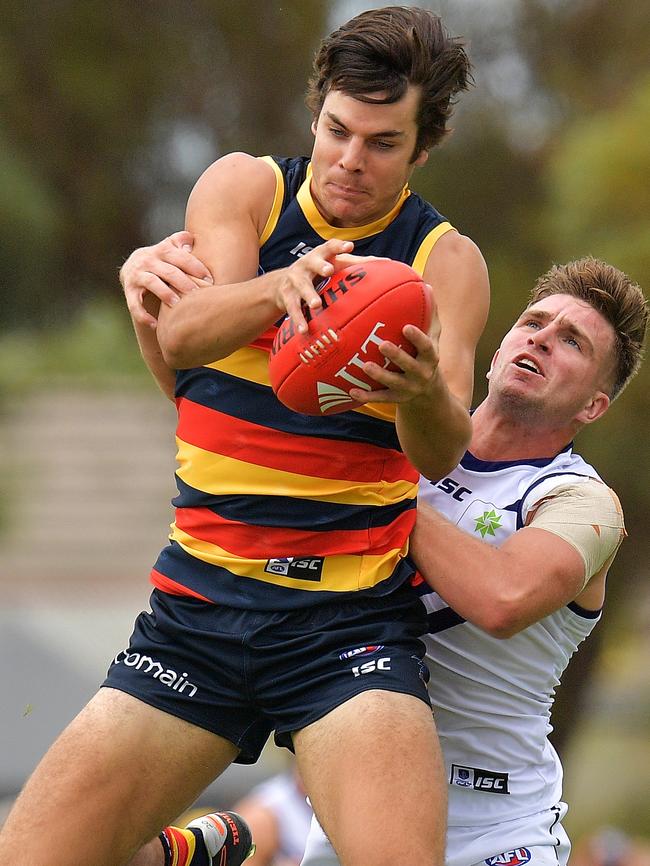 Darcy Fogarty marks the ball during the JLT Community Series AFL match between the Crows and the Fremantle Dockers. Picture: Daniel Kalisz/Getty Images