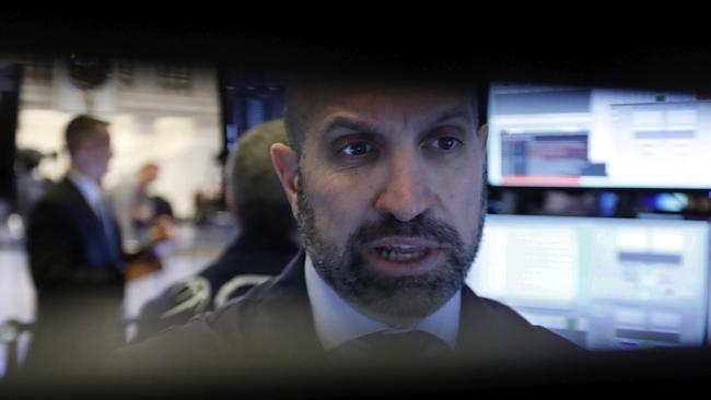 Wall Street traders on another volatile day. Picture: AP