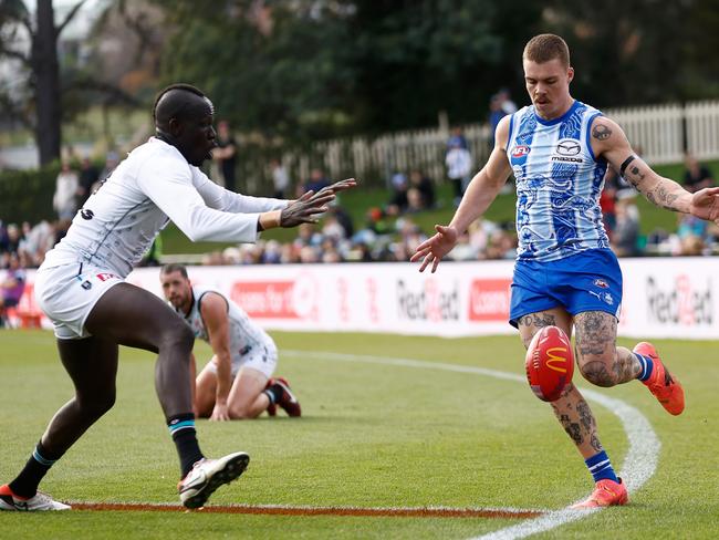 Cameron Zurhaar just keeps the ball in. Picture: Michael Willson/AFL Photos