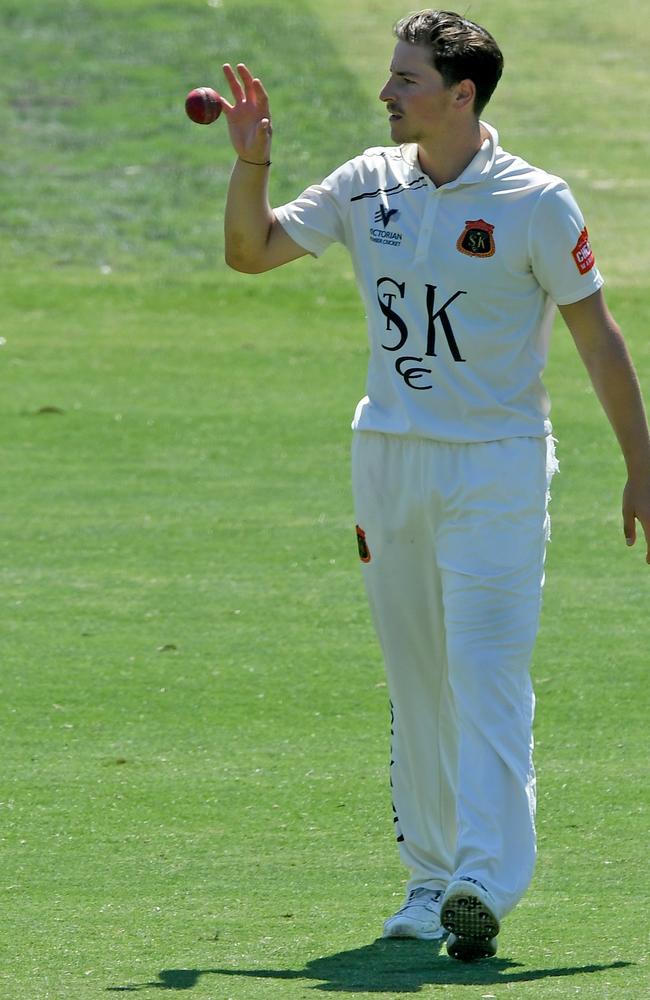 St Kilda’s Jon Merlo takes a bowling stint against Fitzroy Doncaster.