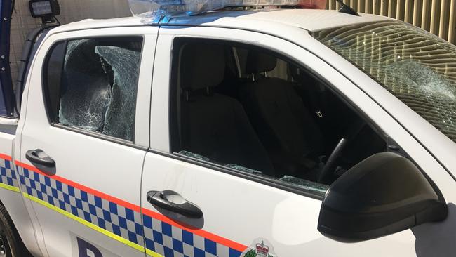 NT Police officers were forced to abandon their vehicle after they had rocks thrown at them at a town camp near Alice Springs.